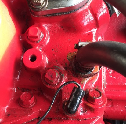 Either of these square nut ports for water temp probe ?