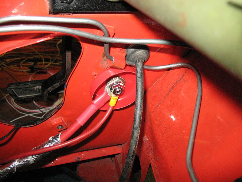 The starter motor and alternator connect to this side.