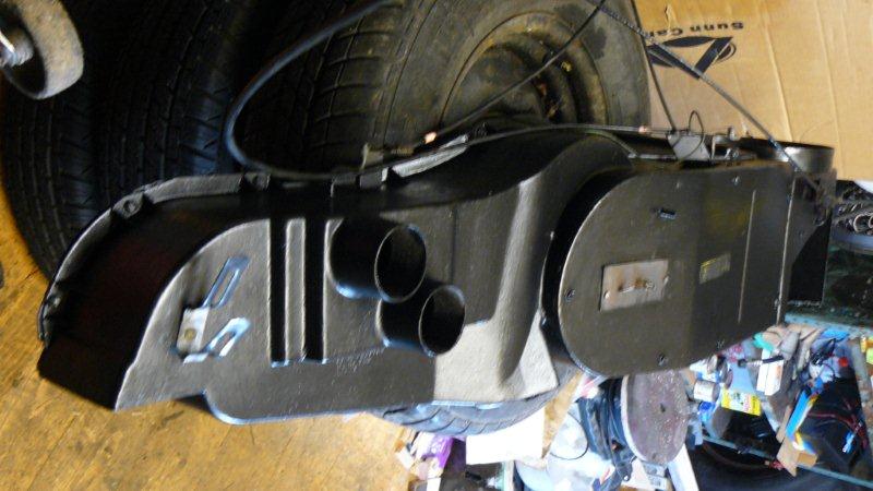 While ist out, strip down, clean, paint, add foam seals throughout and weld up broken flappy door.