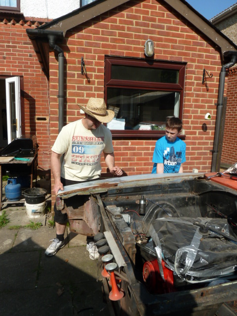 Connor and some bloke in a cowboy hat.