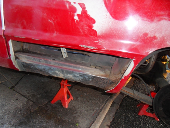 rear drivers quarter cut.JPG