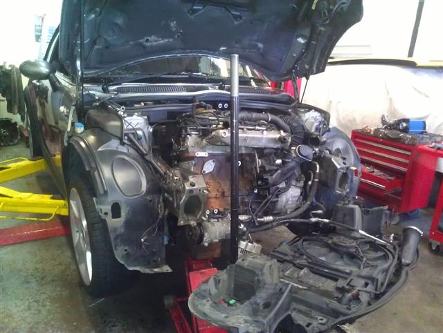 It's not just all about American cars, the front of this Mini had to come off just to put a smaller pulley on the supercharger