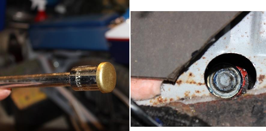 Stick plug to socket on socket extender, drive it into place through hole in bulkhead while lying in the footwell.