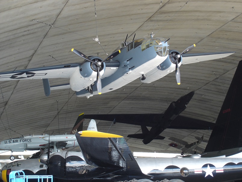 B25 Mitchell and U2 over B29 Superfortress. T33 shooting star to left.