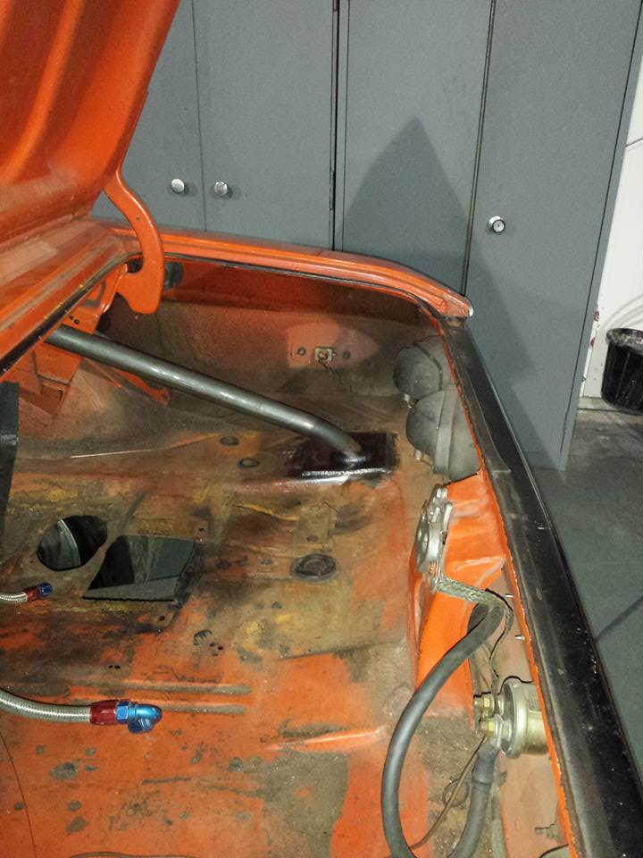 Cage on rear rail.jpg