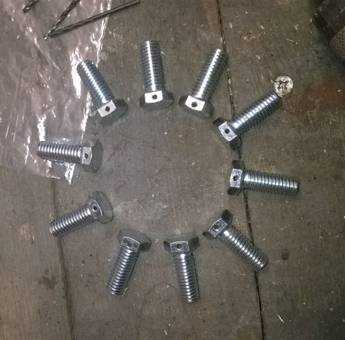 Disc bolts drilled.jpg